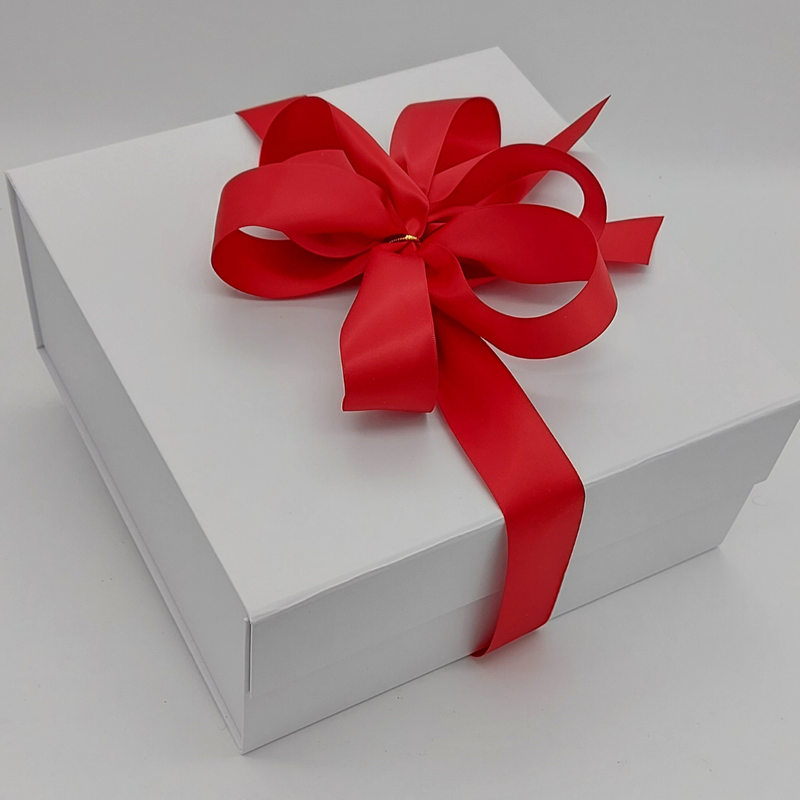 White box with red ribbon